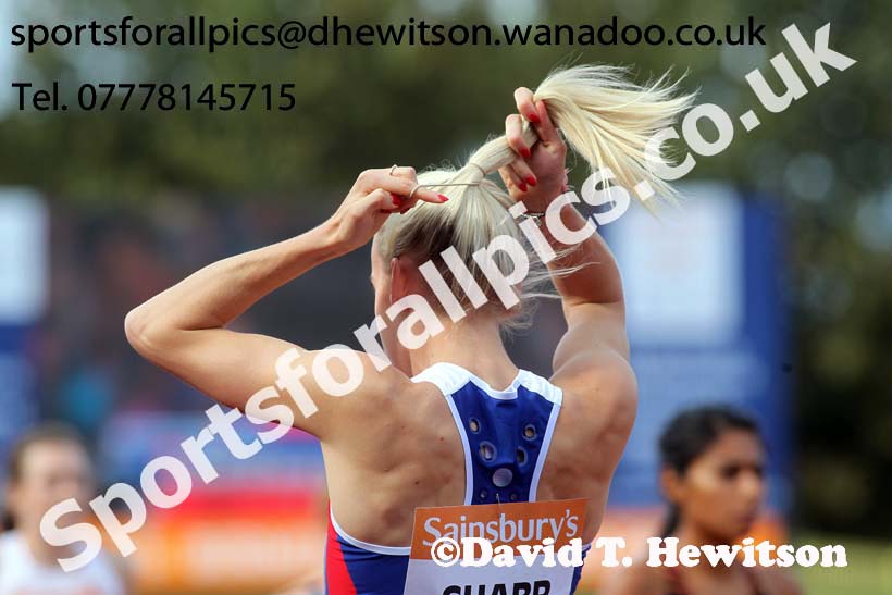 Lynsey Sharp getting the hair right before the start of the 800 metres at the Sainsbury's Birmingham Grand Prix. Photos: David T. Hewitson/Sports for All Pics